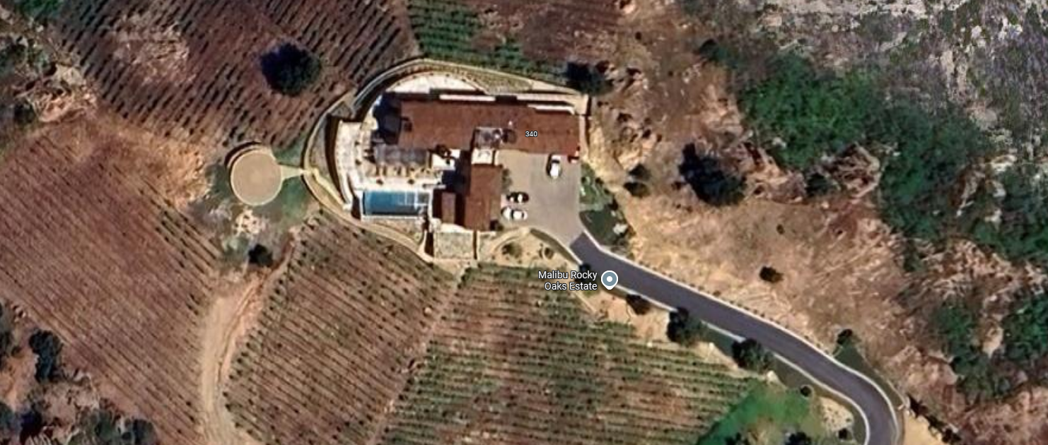 Close-up of Mulholland Highway tasting room interior with wine barrels