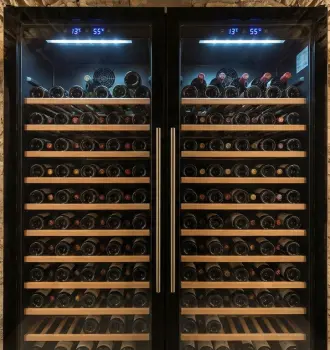 wine bottles stored horizontally in temperature controlled wine fridge cellar