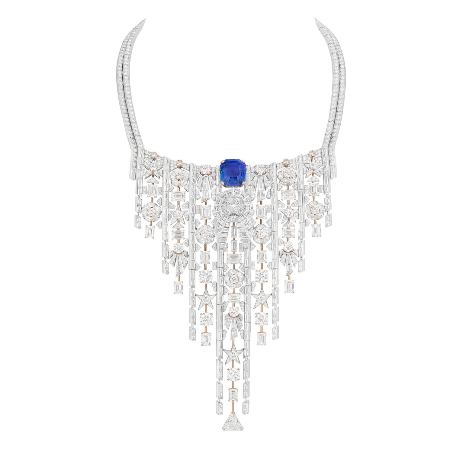 IMPRIMÉ LION NECKLACE Imprimé lion necklace in white gold, rose gold, diamonds and sapphire 1 octagonal-cut sapphire of 20.66 cts 1 cut-cornered triangle DFL diamond of 3.03 cts