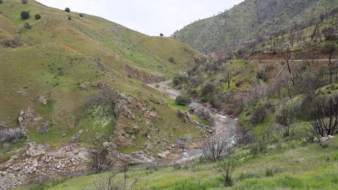 View to the west from the wide pullout at mile 12.1. looking downstream along Del Puerto Creek.  The side canyon from the left at the center of the photo is Slick Rock Canyon.