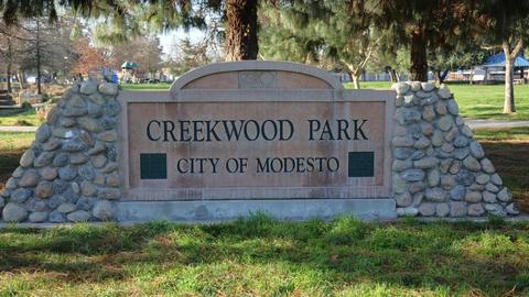 Creekwood Park sign at the northeast corner of the park near the intersection of  Creekwood Drive and Ardia Avenue.