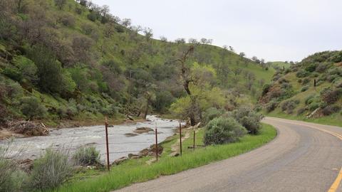 View of Del Puerto Creek and Del Puerto Canyon Road in the lower canyon region, approximately 7.5 miles into the canyon.