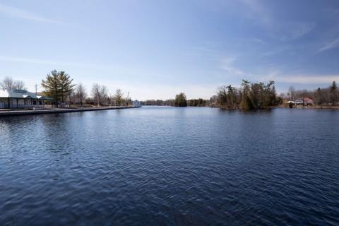 Lakefield Waterfront, looking south down the Otonabee River, Lakefield, Peterborough Co., ON, 30 March 2024