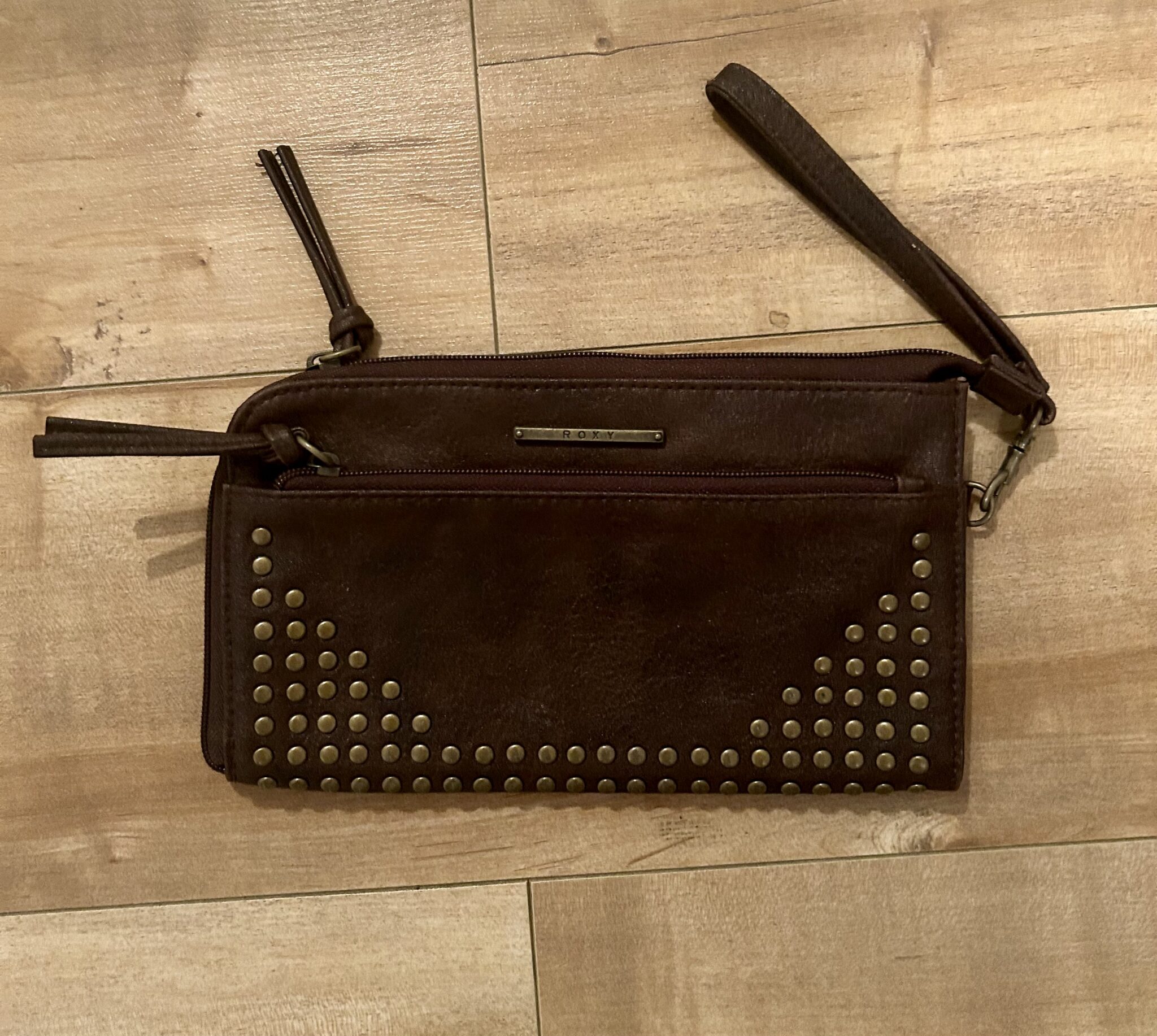 Featured image for Roxy vintage porte feuilles avec sangle