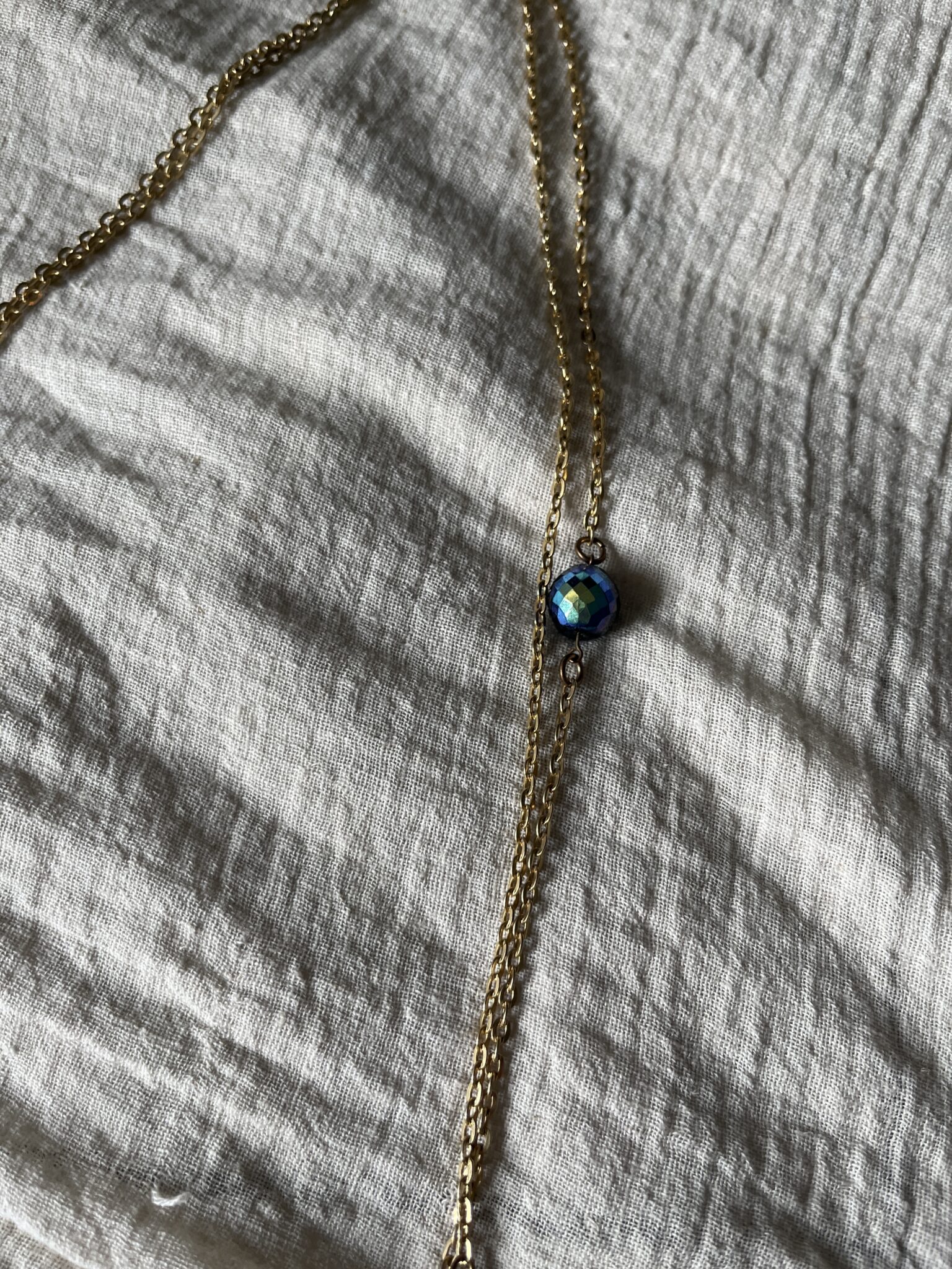 Featured image for Long gold necklace