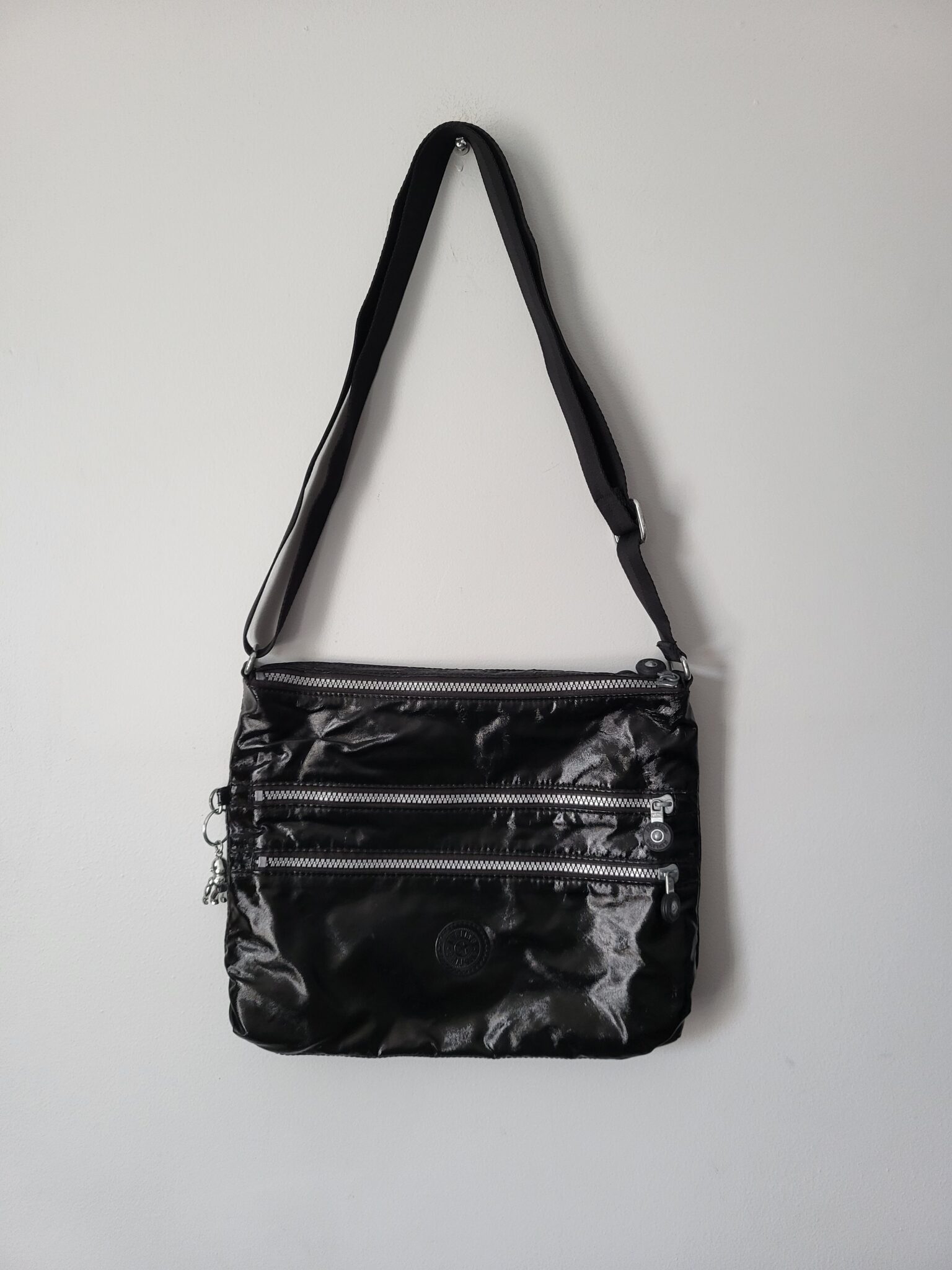 Featured image for KIPLING black bag with shiny effect