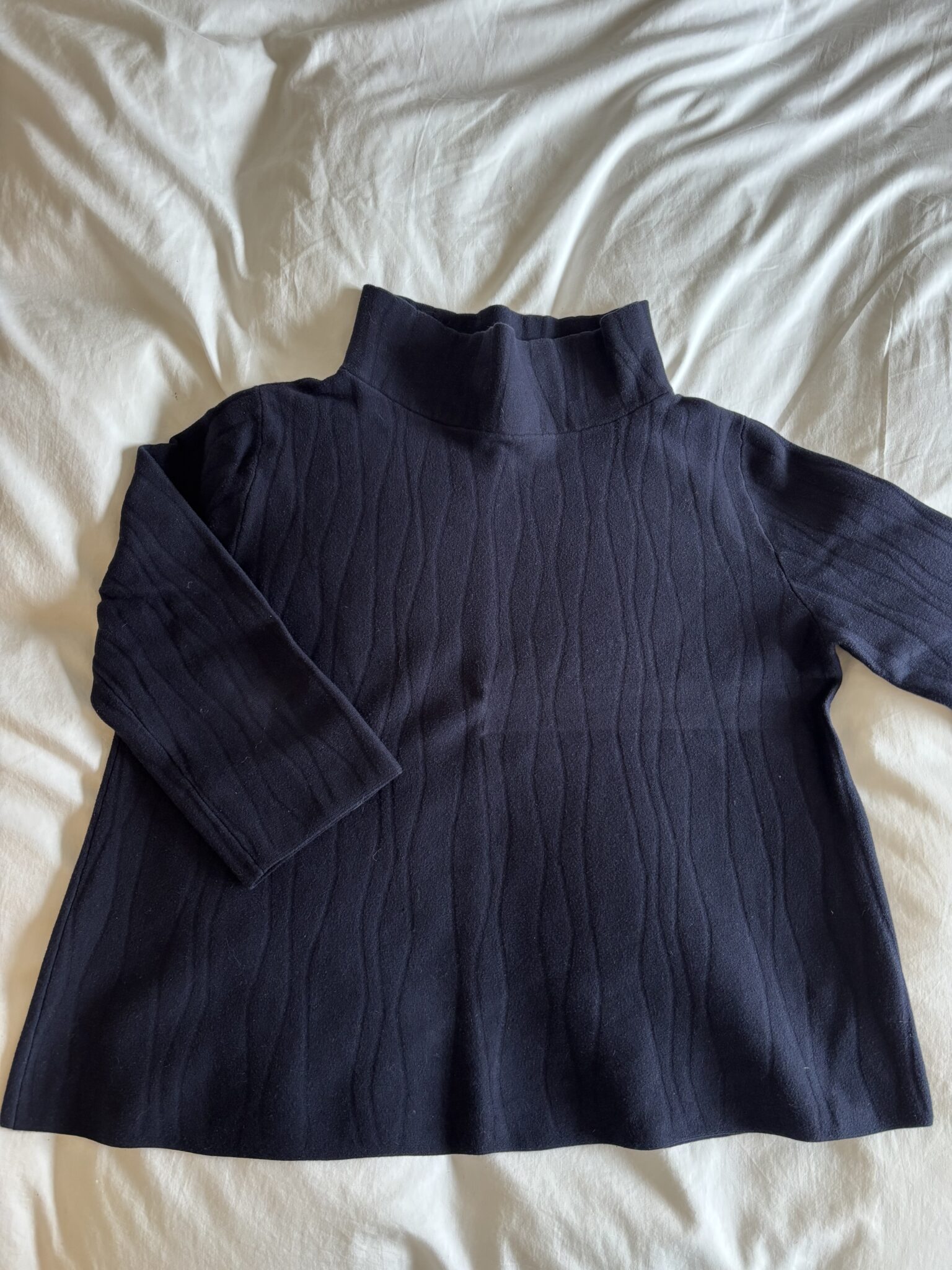 Featured image for Funnel neck jumper