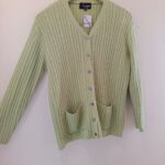 Featured thumbnail for Almond green vintage-style cable-knit cardigan
