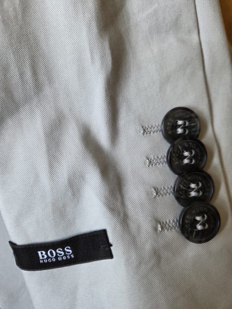 Featured image for Veste HUGO BOSS gris clair, jamais portée, coupe slim, 5 ans