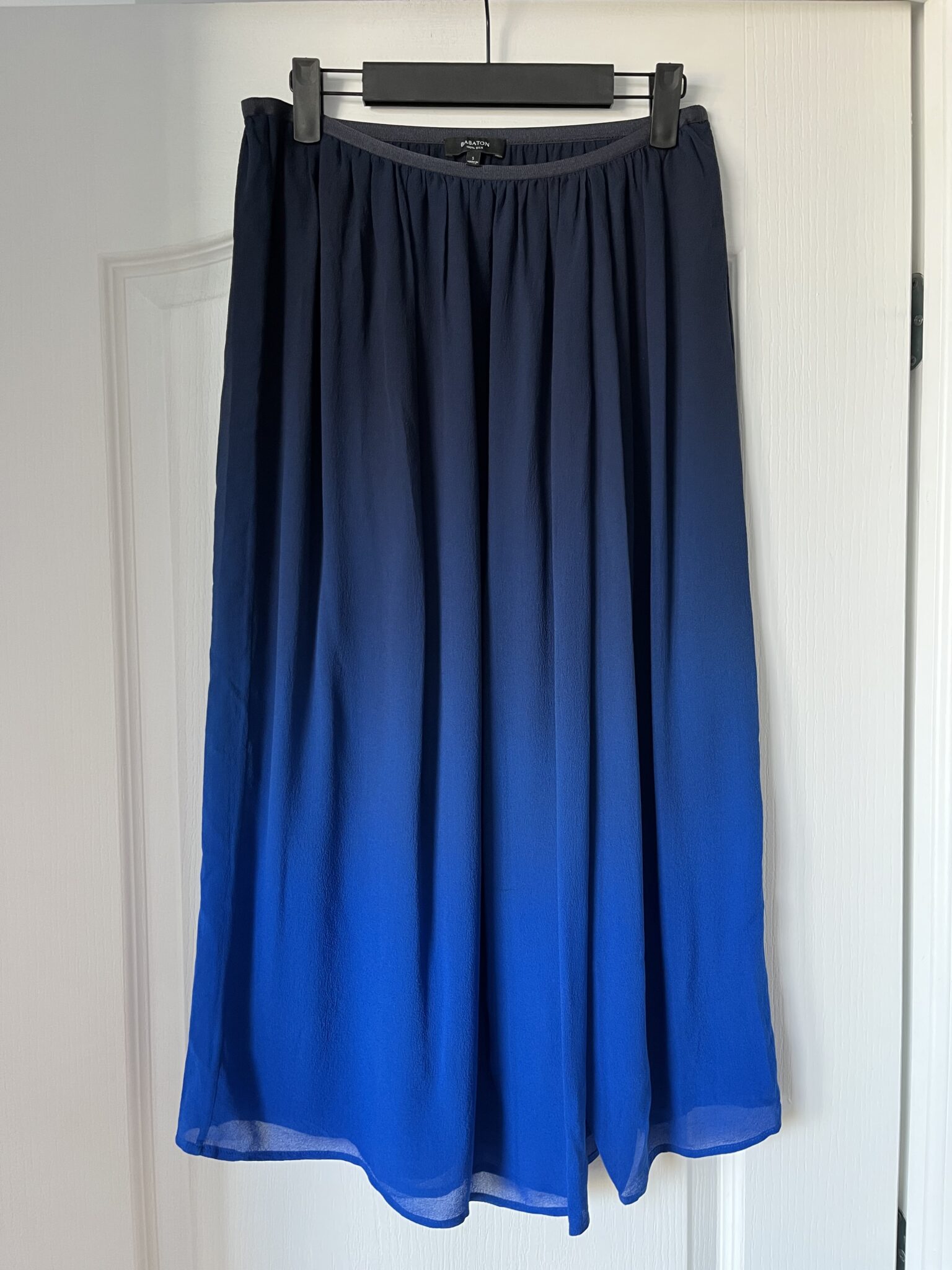 Featured image for Babaton 100% silk skirt