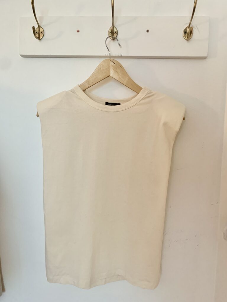 Featured image for Cream tank top with epaulettes
