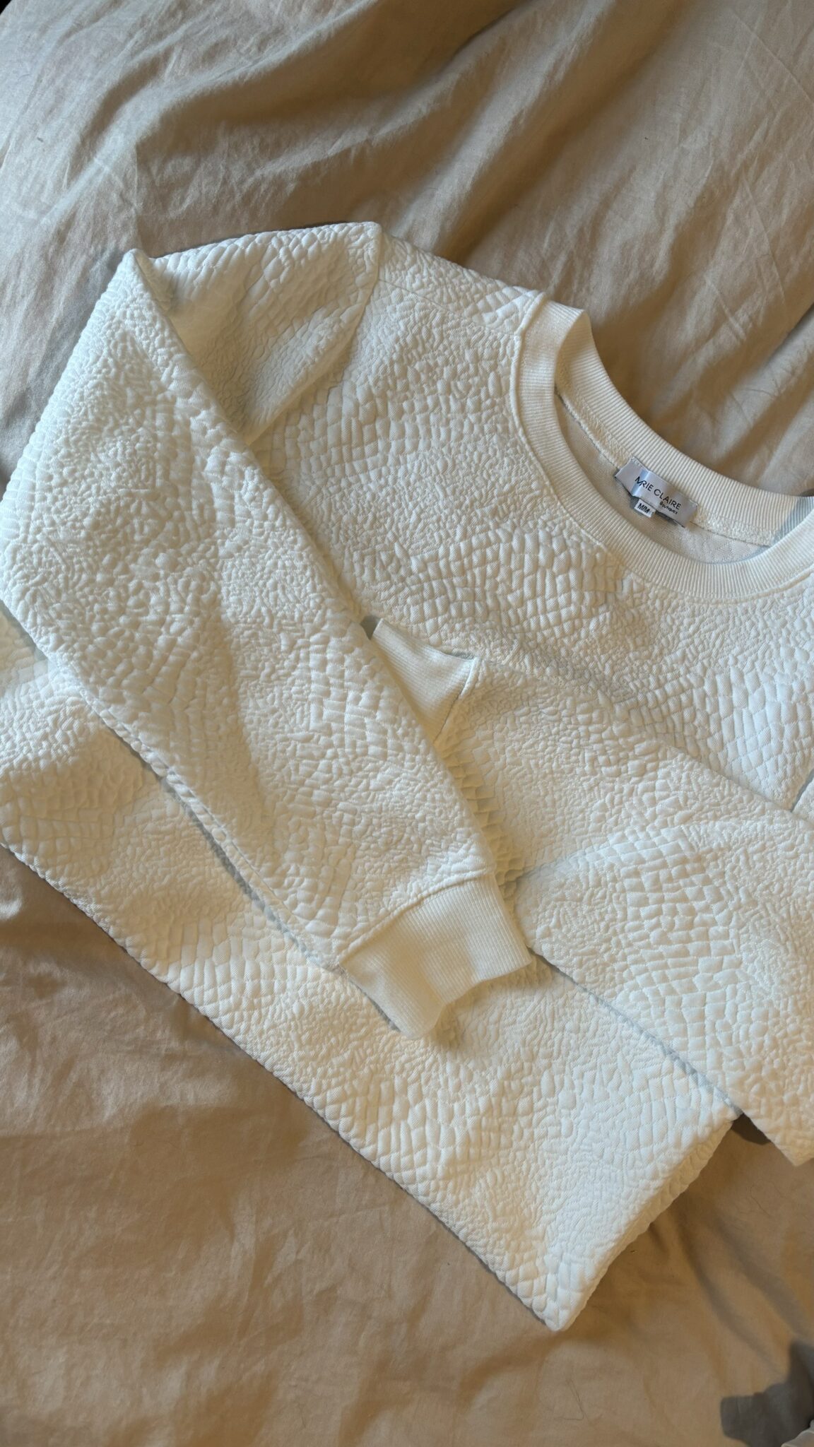 Featured image for Pull blanc texturé