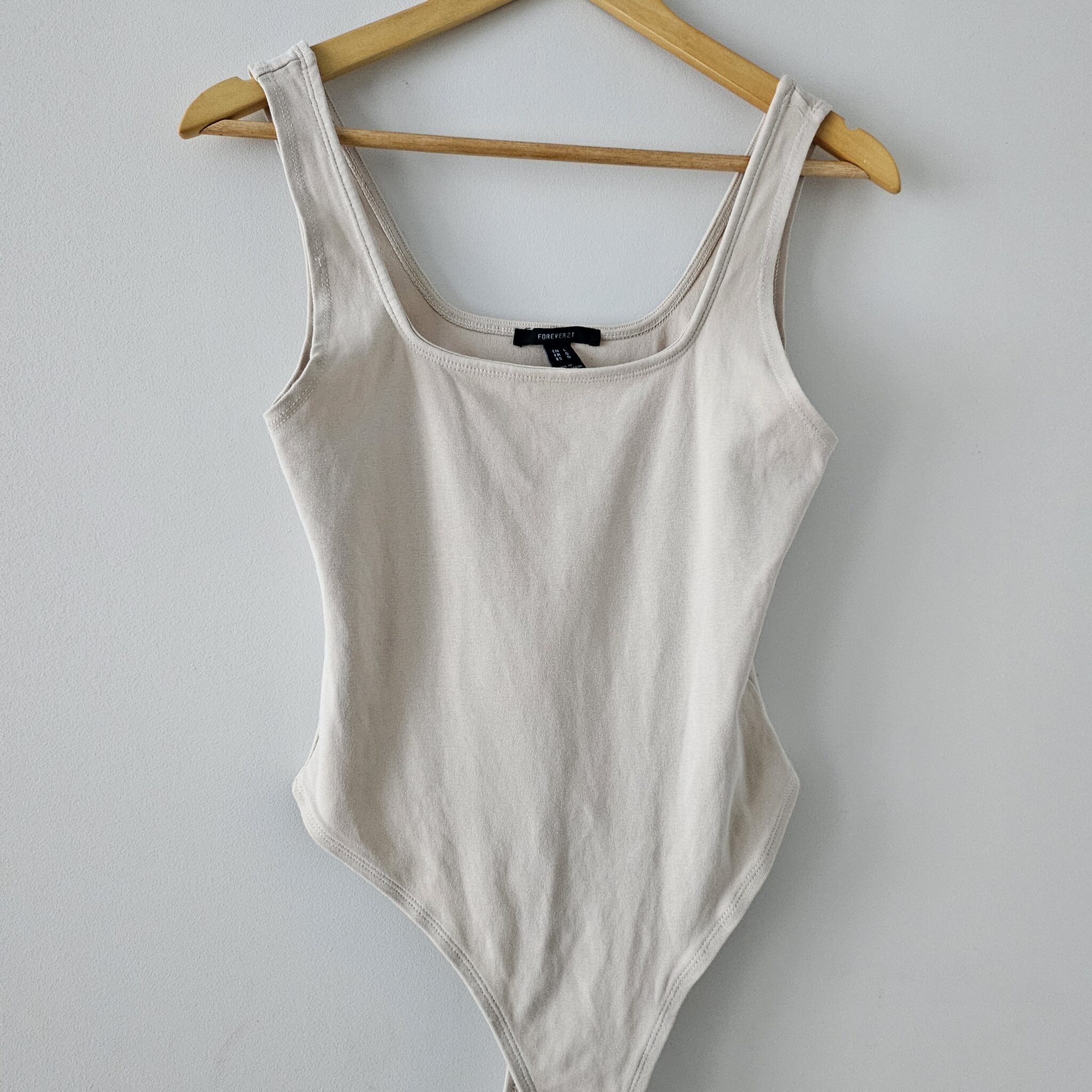 Featured image for Beige bodysuit
