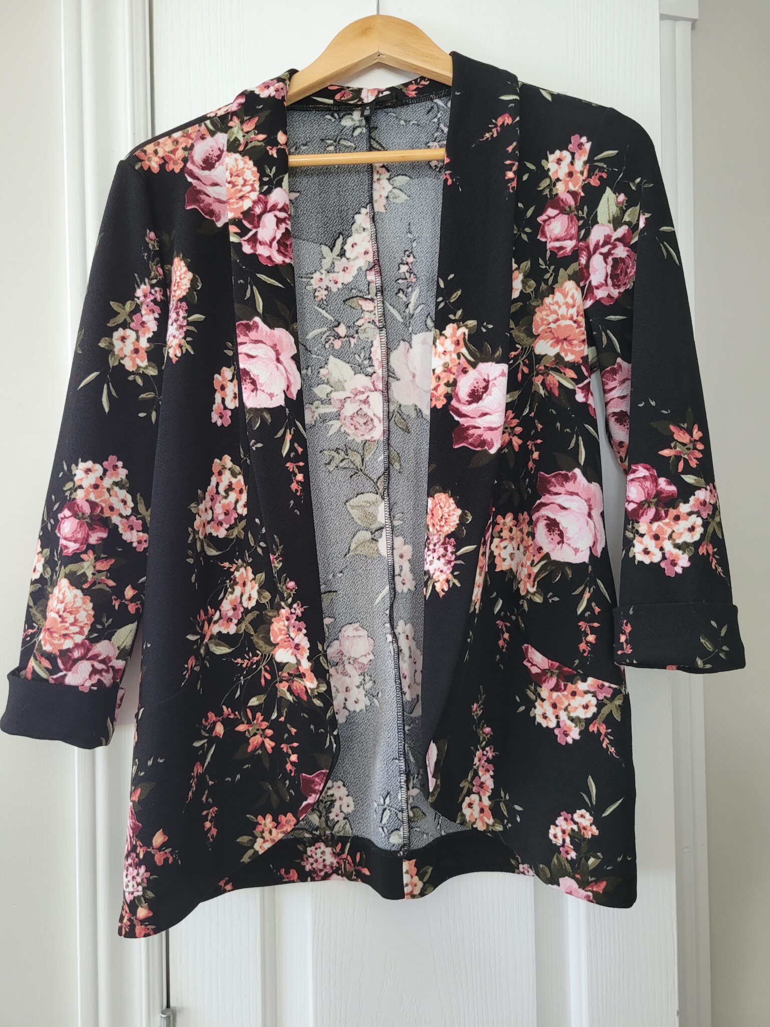 Featured image for Black soft jacket with flowers