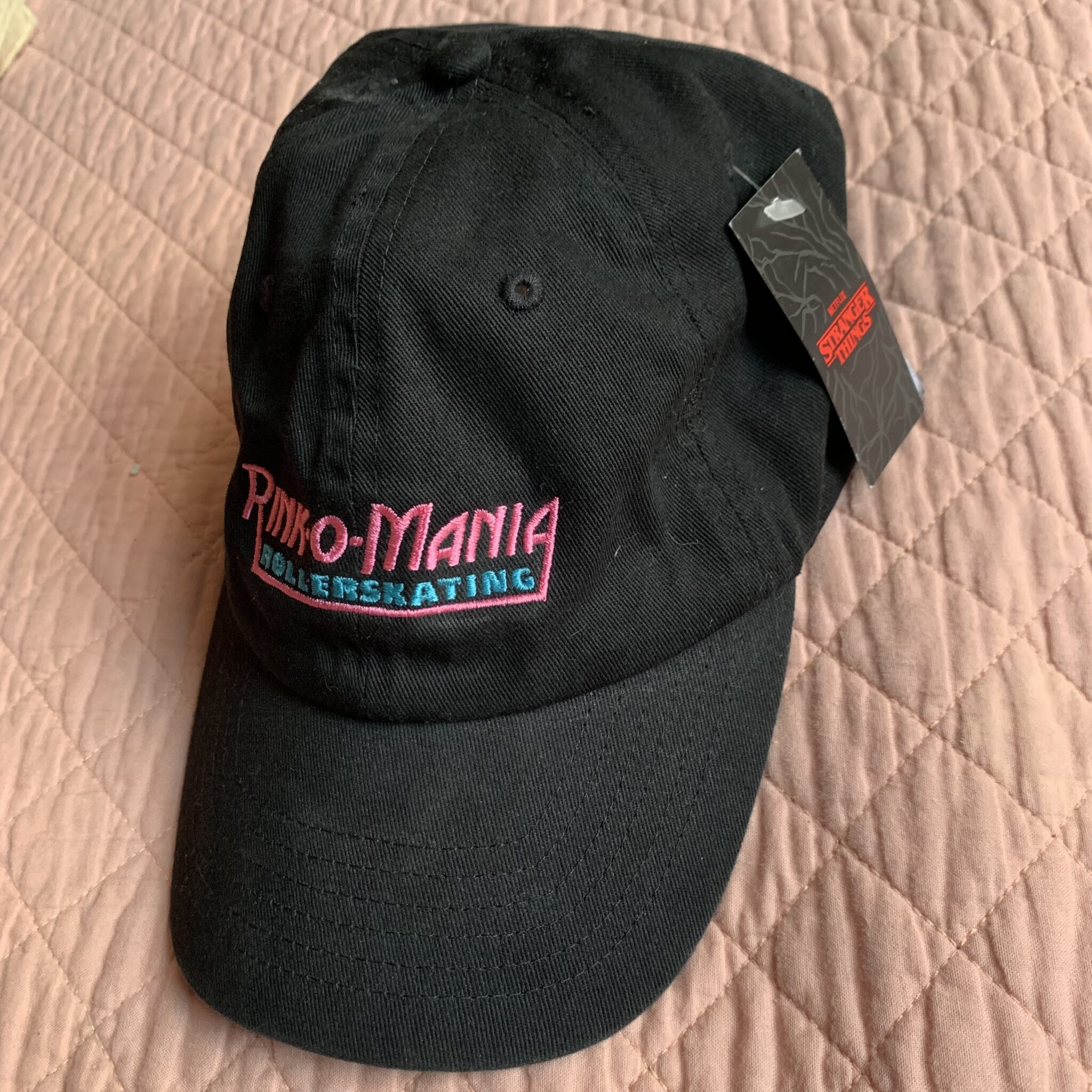 Featured image for Stranger Things - Black Strapback Embroidered Cap - Rink-o-Mania - Netflix Official