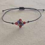 Featured thumbnail for SAGE BOHÈME adjustable bracelet in a weave of lossy flowers - blue-grey