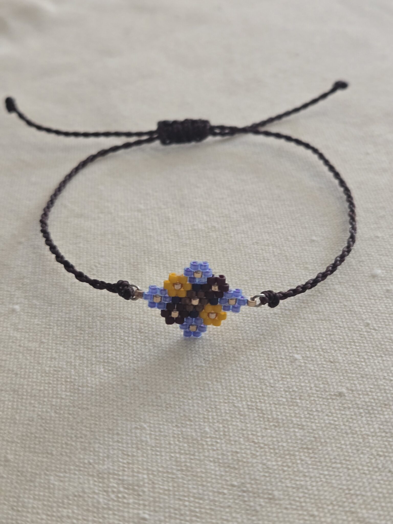 Featured image for SAGE BOHÈME adjustable bracelet in woven pearl flowers - dark brown