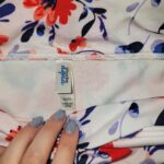Thumbnail for White and floral swimming costume