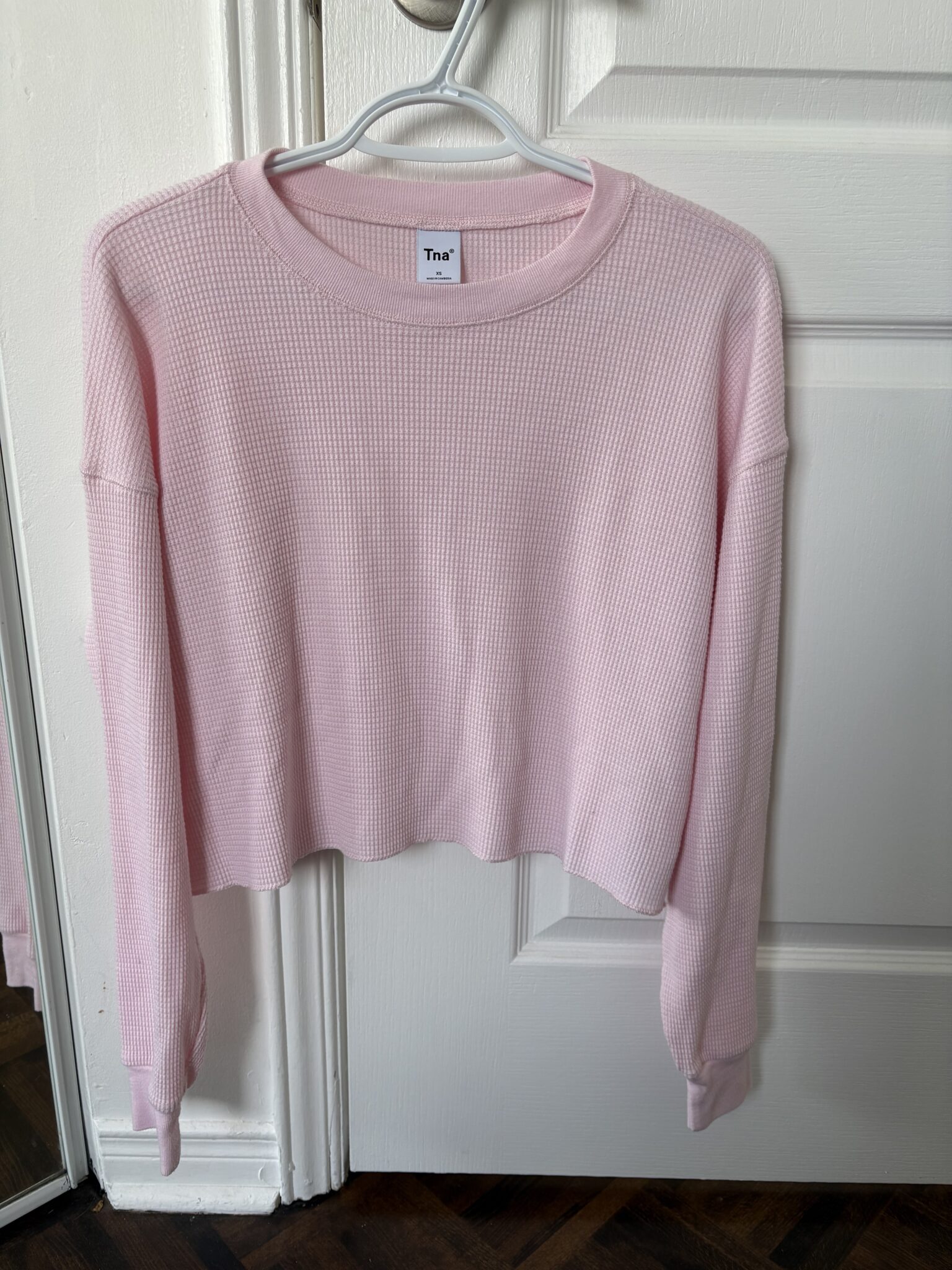 Featured image for Chandail gaufré rose Aritzia