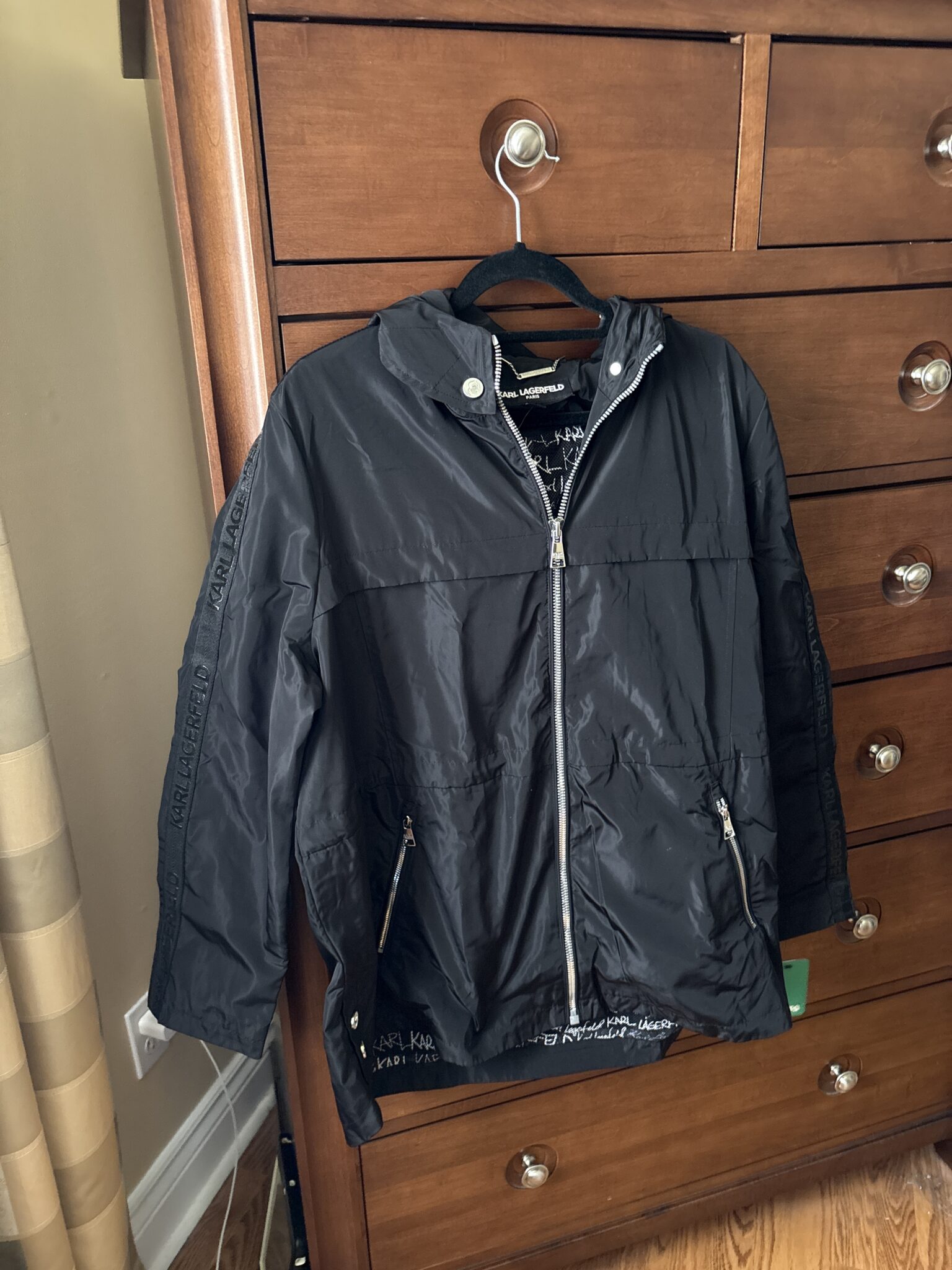 Featured image for Black mid-season waterproof coat
