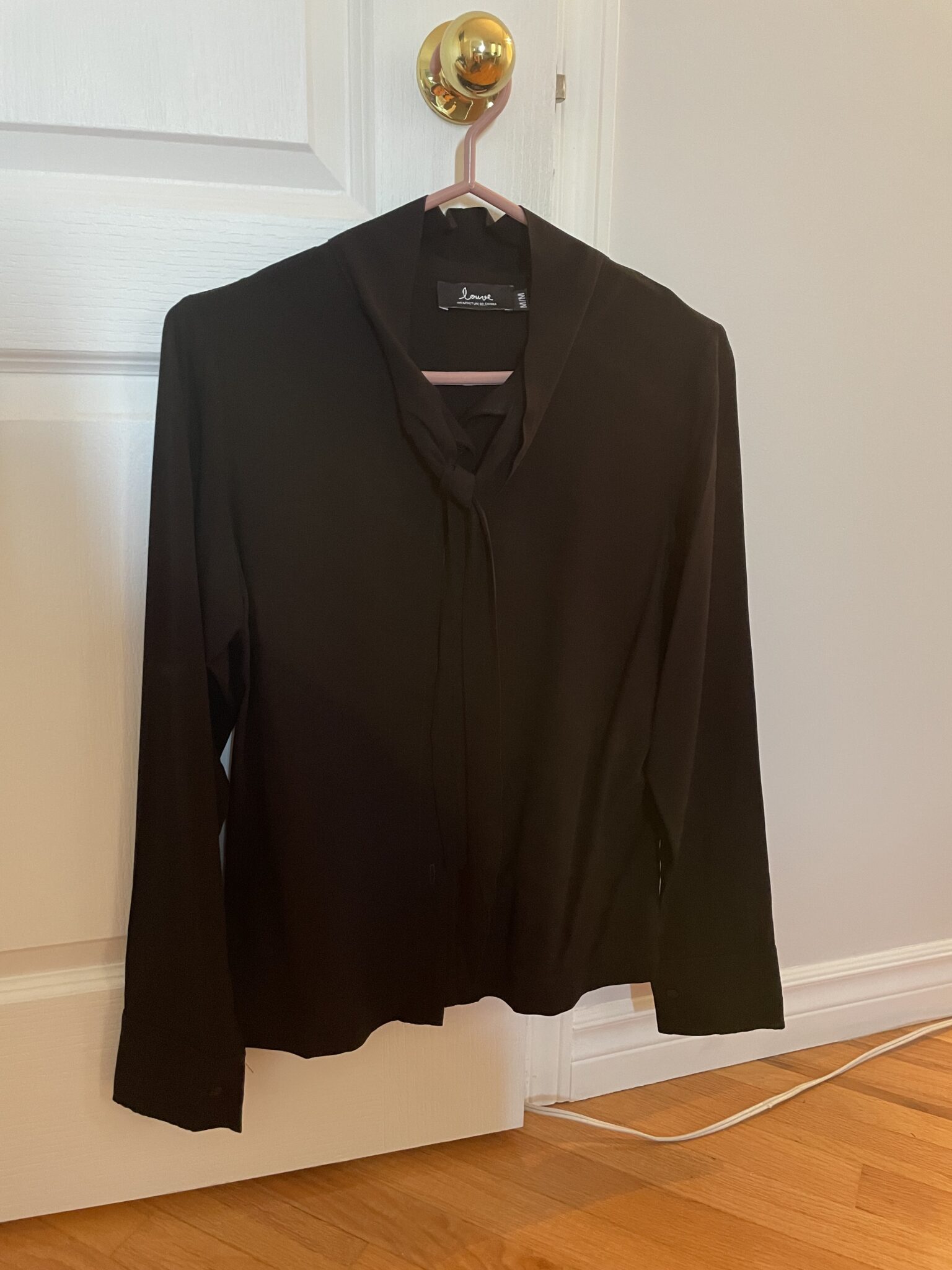 Featured image for Louve Design black blouse