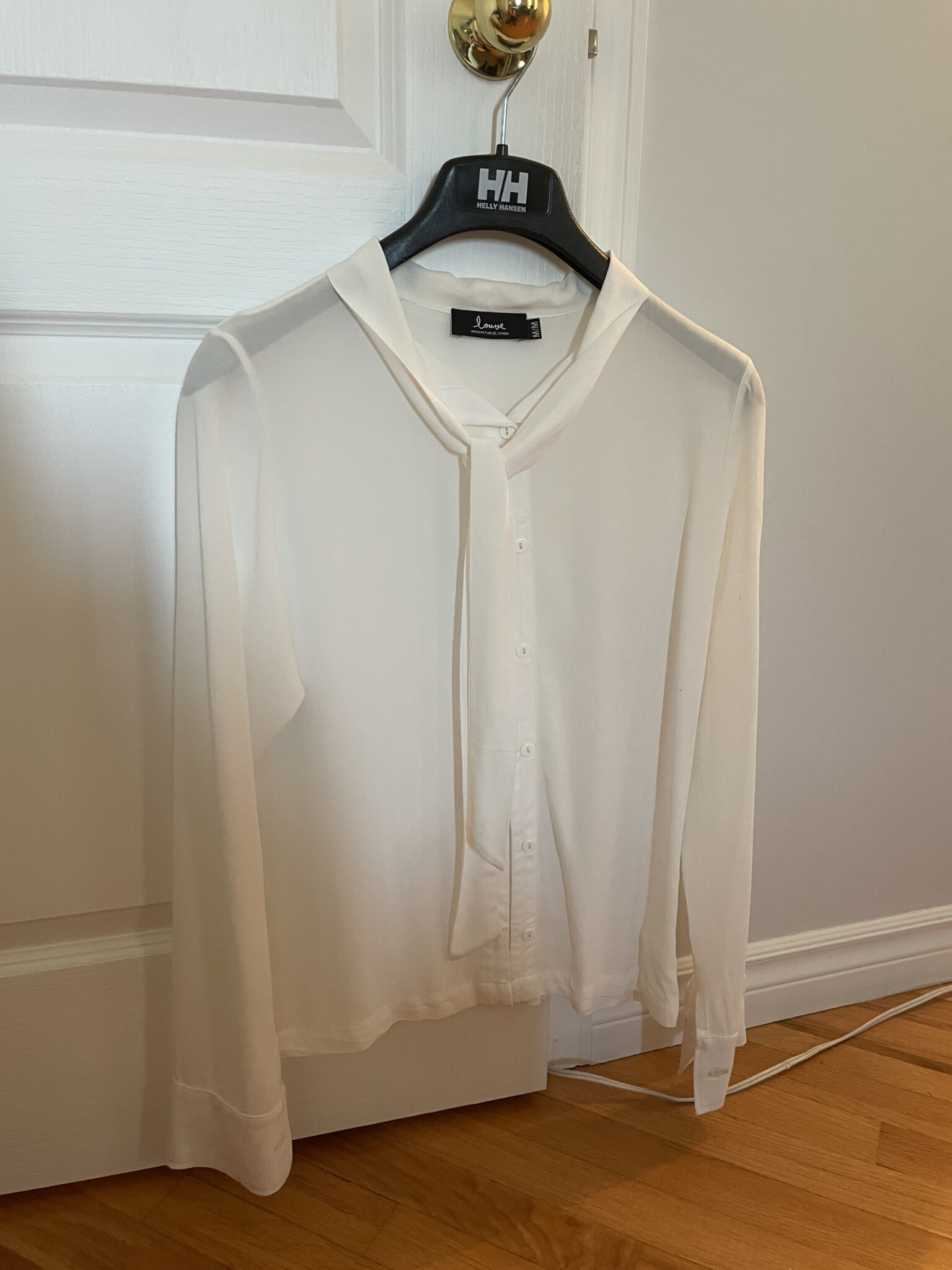Featured image for Louve Design white blouse