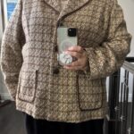 Featured thumbnail for Beige tweed-effect jacket.