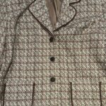 Thumbnail for Beige tweed-effect jacket.