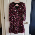 Featured thumbnail for Kate Spade short dress with long sleeves and ribbon motif