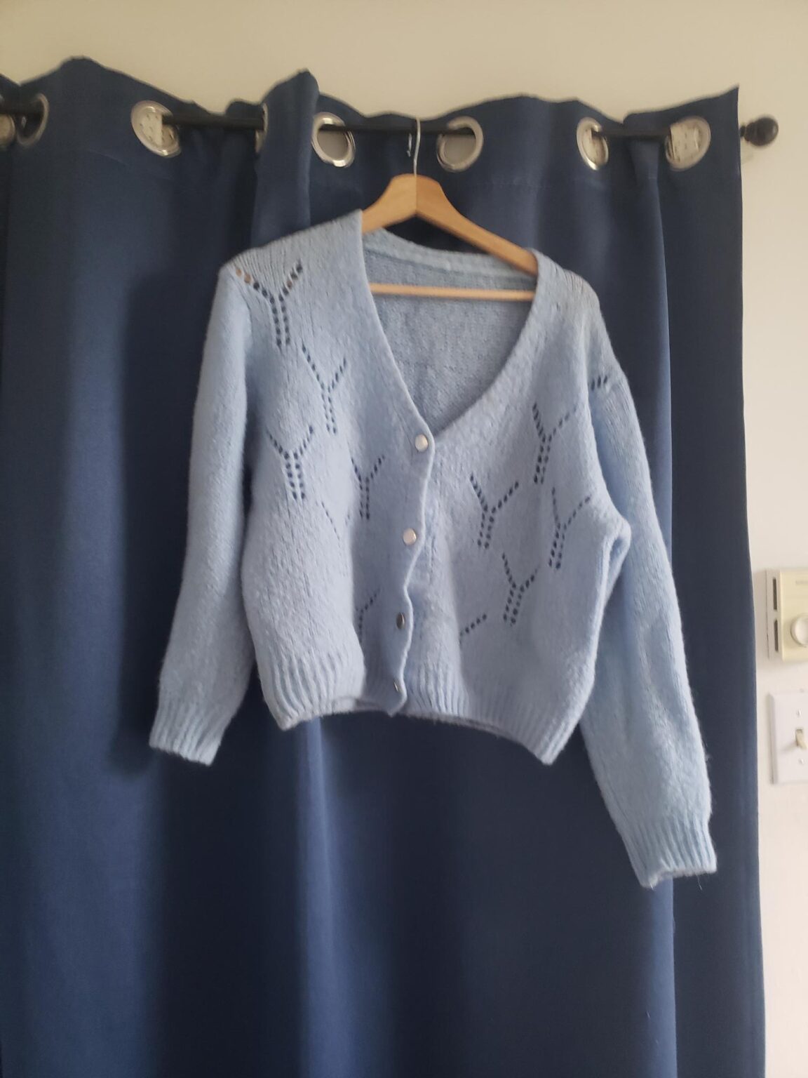 Featured image for light blue waistcoat with gold button