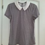 Featured thumbnail for Chandail à col de chemise