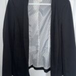 Featured thumbnail for Long-sleeved black jacket