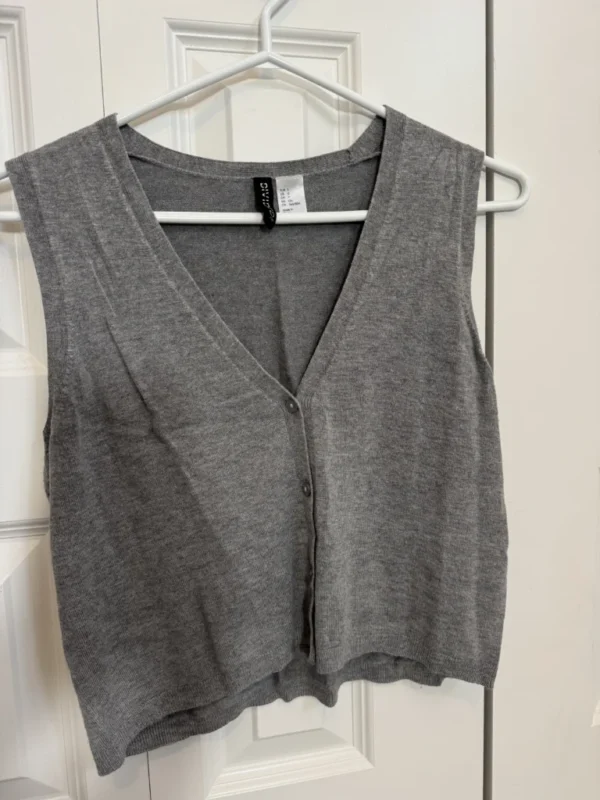 Featured image for Pale grey sleeveless cardigan
