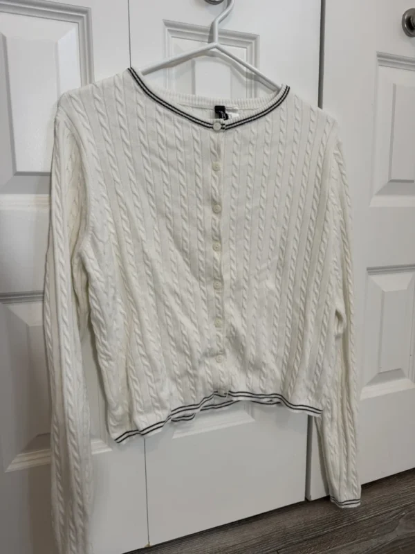 Featured image for White cardigan with sleeve detail