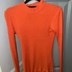 Featured thumbnail for Col roulé orange Simons