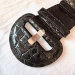 Featured thumbnail for Black elastic belt, faux patent leather