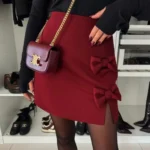 Featured thumbnail for Wine red skirt with buckles