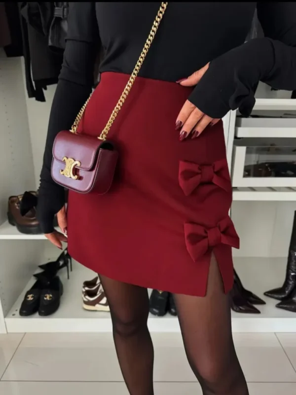 Featured image for Wine red skirt with buckles