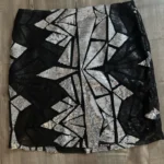 Featured thumbnail for Jupe paillettes noir et argent