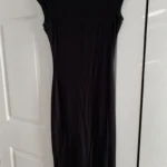 Featured thumbnail for Robe noire à manches capuchon