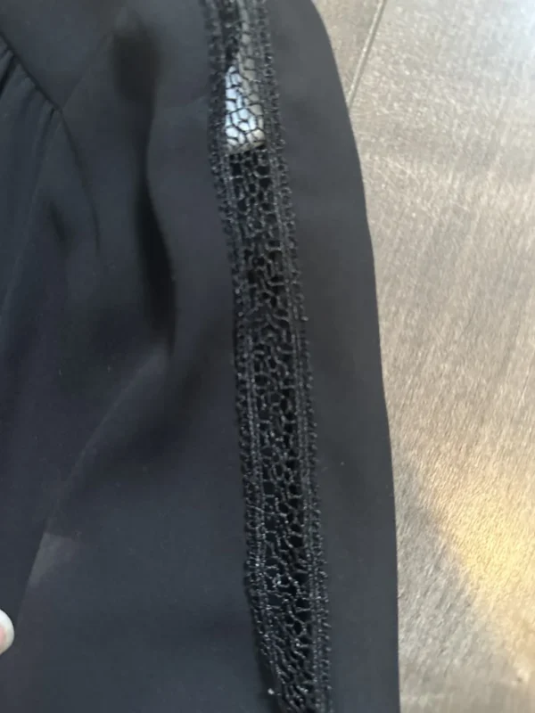 Image for Veste noire avec détails sur les manches