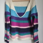 Featured thumbnail for Colourful hand-knitted jumper
