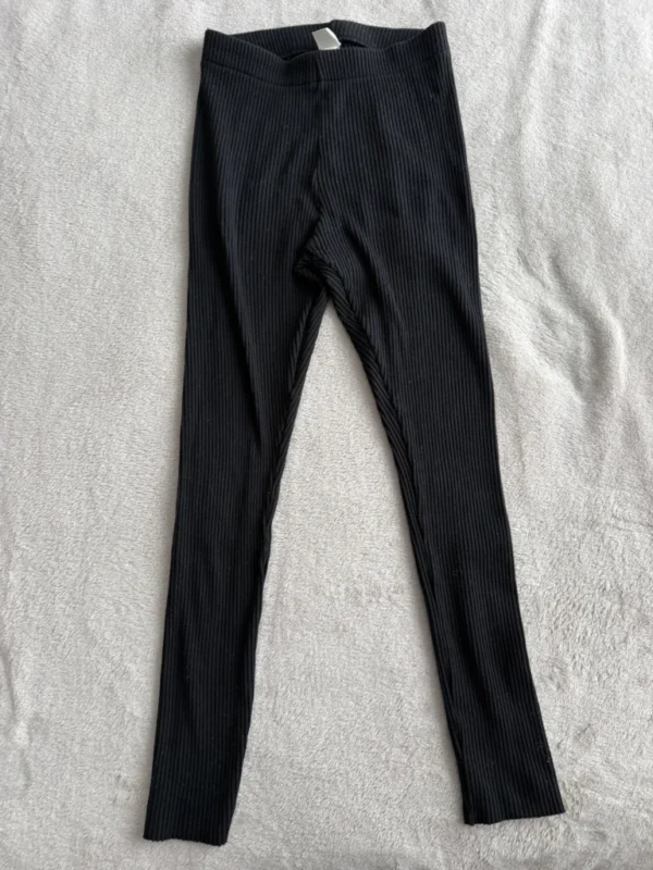 Featured image for Black ribbed leggings