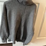 Featured thumbnail for Grey turtleneck jumper