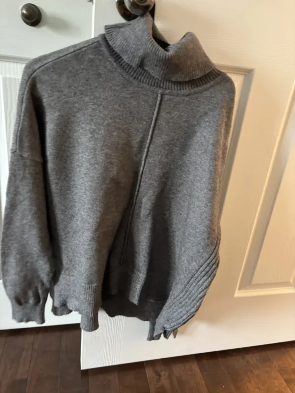 Featured image for Grey turtleneck jumper