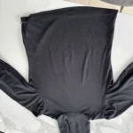Featured thumbnail for Black high-neck jumper