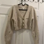 Featured thumbnail for Cropped jumper with embroidered flowers