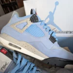 Thumbnail for Nike Jordan 4 UNC