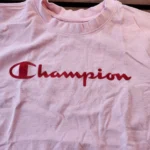 Thumbnail for Chandail courts Champion rose