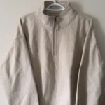 Featured thumbnail for Chandail demi-zip manches longues beige